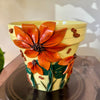 8" Flower Pot: Yellow w/ Orange Flowers