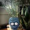 Resting Plant Face - Shrunken Head Concrete Planter: Drainage