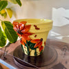 8" Flower Pot: Yellow w/ Orange Flowers