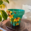 8" Flower Pot: Teal w/ Orange Flowers
